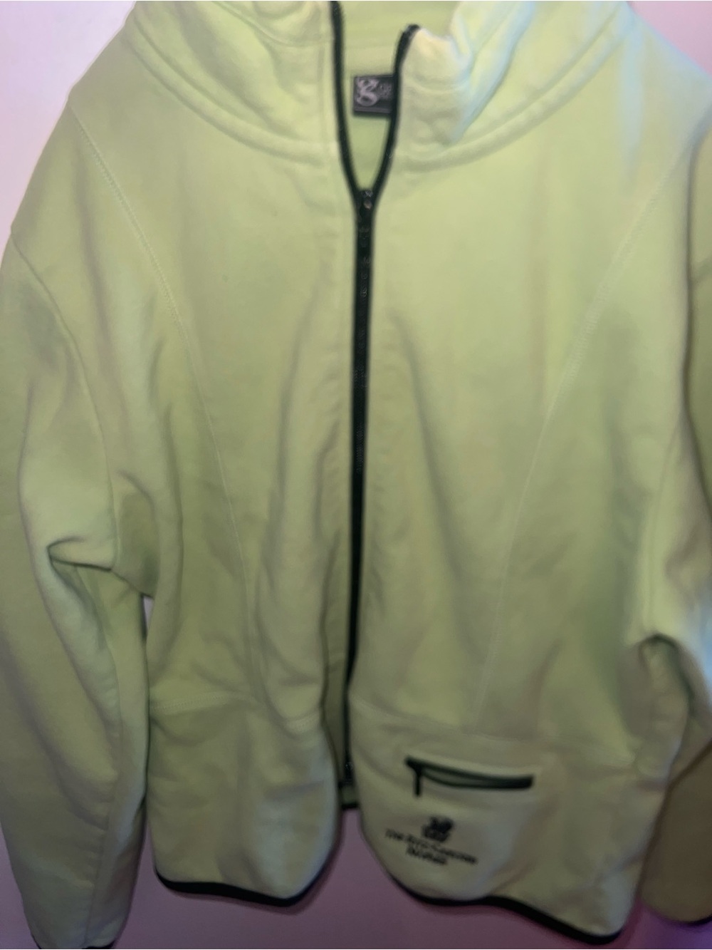 Ritz Carlton Naples logo on green fleece jacket